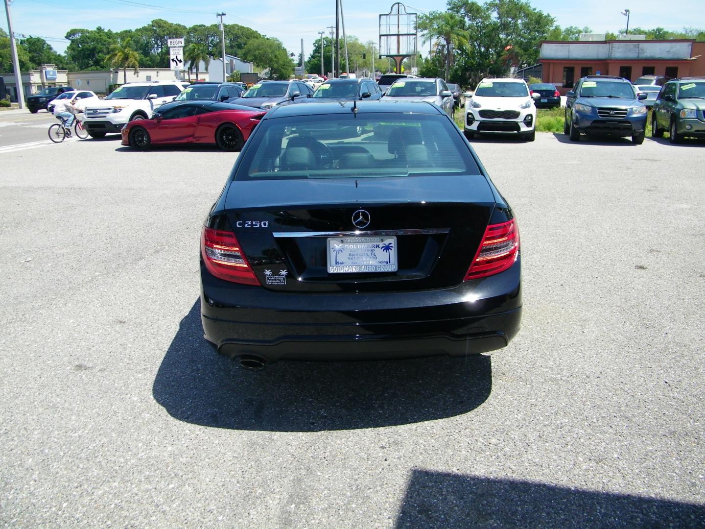 2013 Black /Black Mercedes-Benz C-Class C250 Sport Sedan (WDDGF4HB1DR) with an 3.0L V6 DOHC 16V engine, 7-Speed Automatic transmission, located at 4000 Bee Ridge Road, Sarasota, FL, 34233, (941) 926-0300, 27.298664, -82.489151 - Photo#4